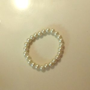 White pearl bracelet.